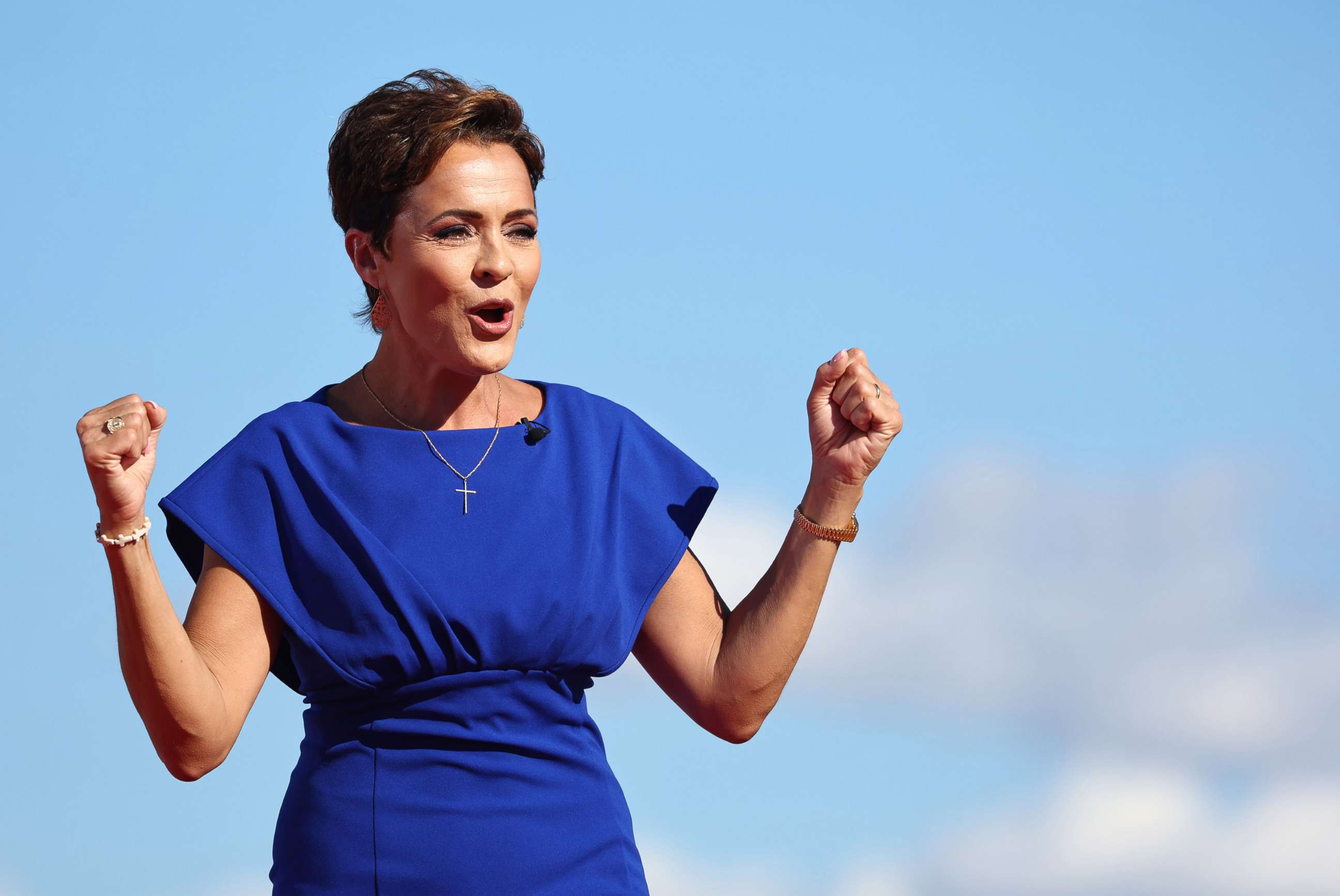 PHOTO: Arizona Republican nominee for governor Kari Lake speaks during a campaign rally attended by former U.S. President Donald Trump, on Oct. 9, 2022 in Mesa, Ariz.