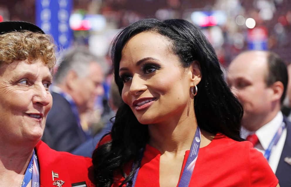 PHOTO: Republican Presidential Candidate Donald Trump spokeswoman Katrina Pierson, right, talks with delegates on the convention floor during the final day of the Republican National Convention in Cleveland, July 21, 2016.