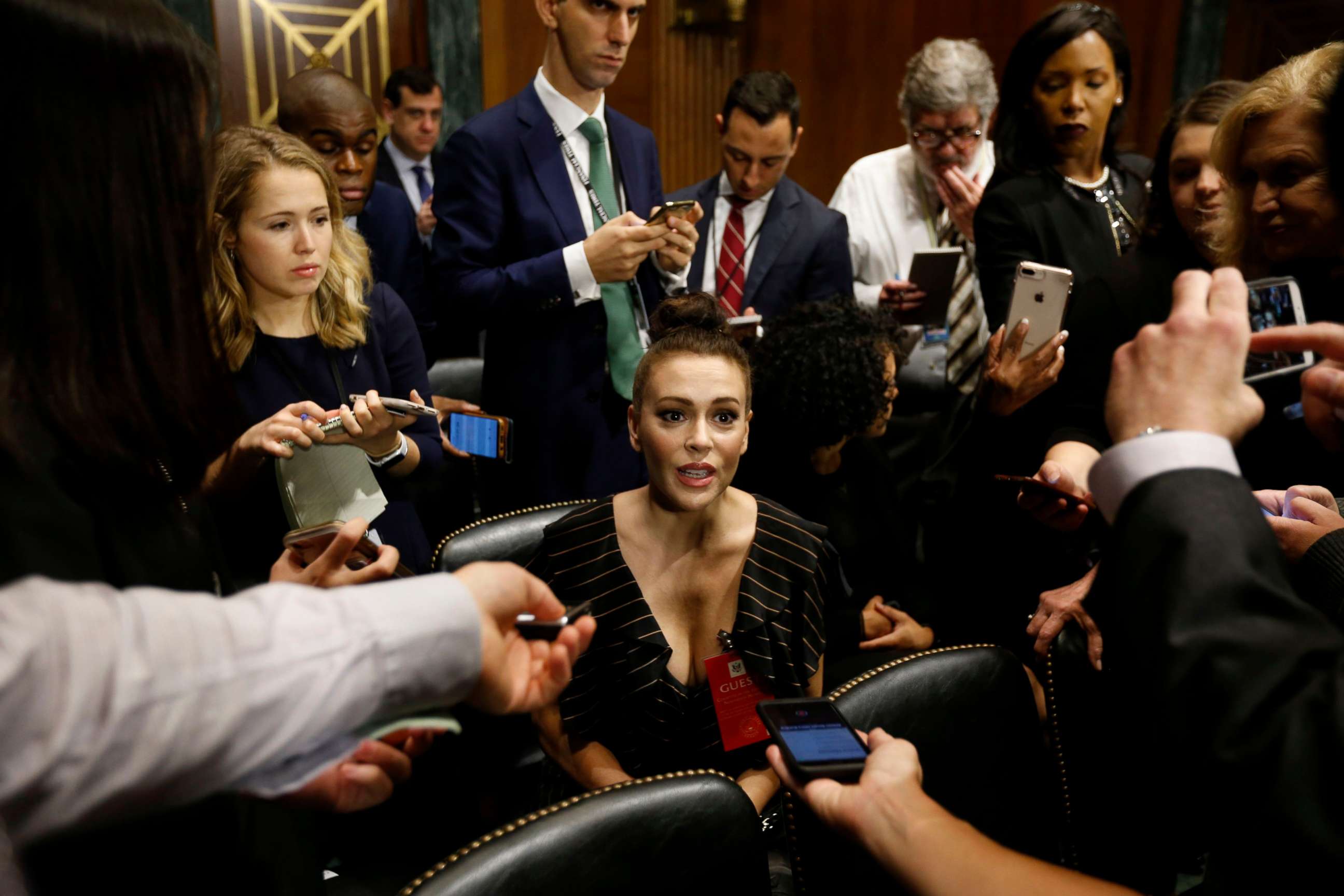 PHOTO: Actress Alyssa Milano talks to media before the Senate Judiciary Committee hearing on the nomination of Brett Kavanaugh to be an associate justice of the Supreme Court in Washington, Sept. 27, 2018.