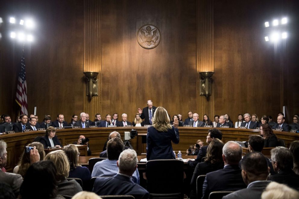 PHOTO: Christine Blasey Ford is sworn in by Senate Judiciary Committee chairman Chuck Grassley on Capitol Hill, Sept. 27, 2018 in Washington.