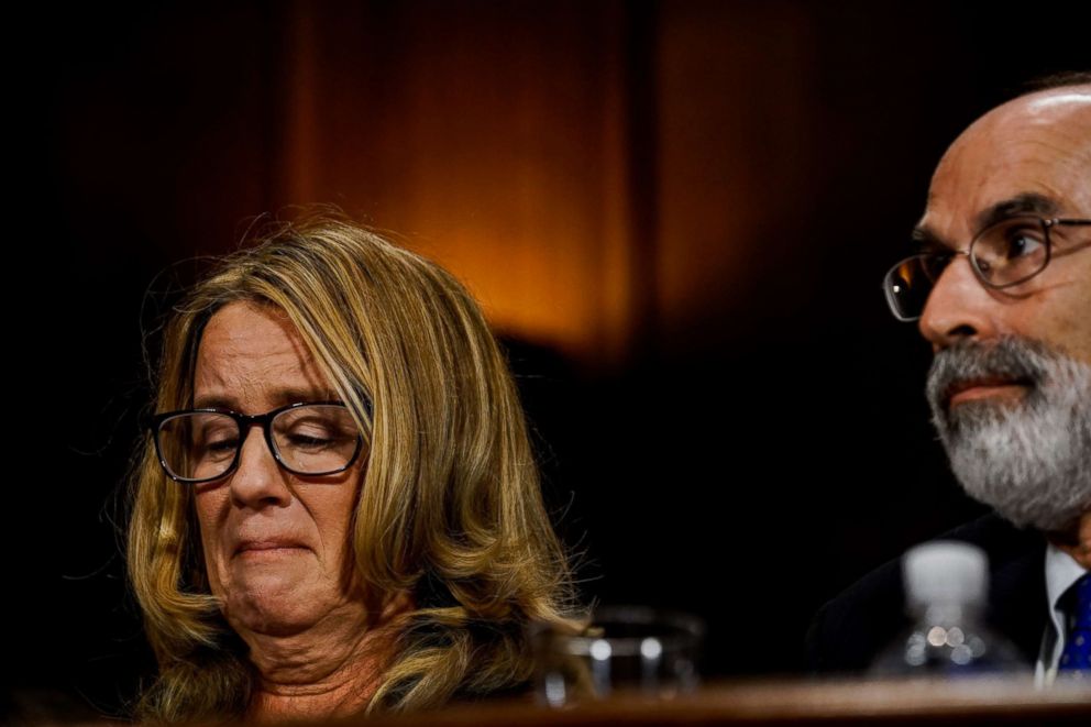 PHOTO: Christine Blasey Ford, sitting next to one of her lawyers, Michael R. Bromwich, tears up during a Senate Judiciary Committee hearing on Capitol Hill, Sept. 27, 2018 in Washington.