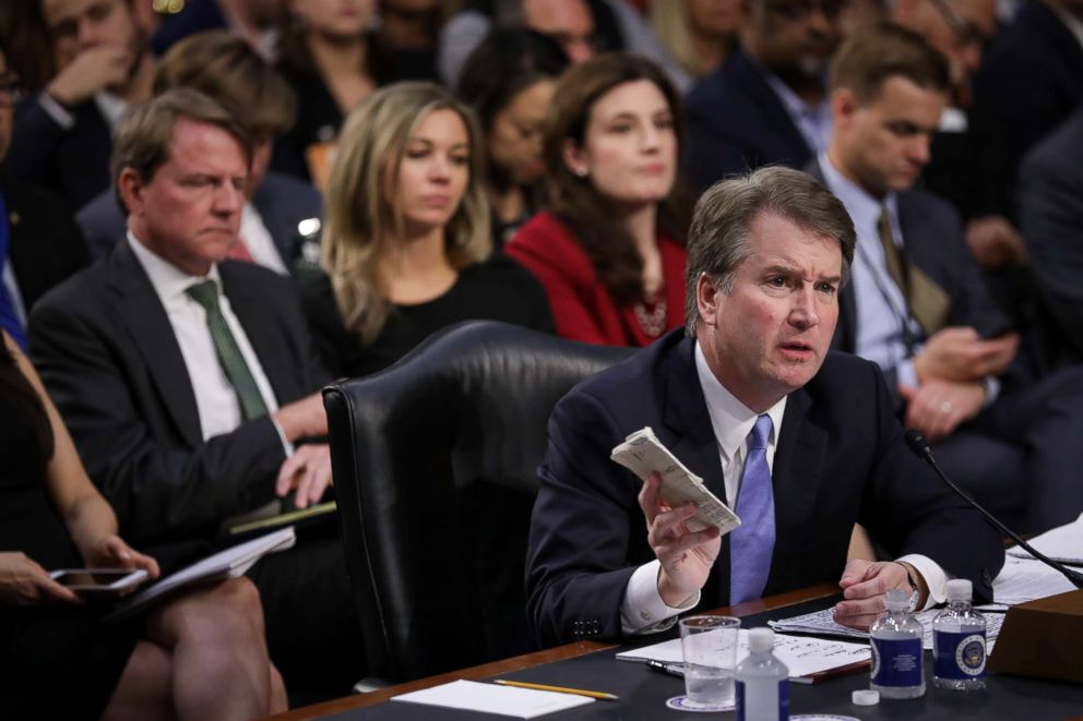 PHOTO: Supreme Court nominee Judge Brett Kavanaugh holds a copy of the Constitution as he testifies before the Senate Judiciary Committee on the third day of his Supreme Court confirmation hearing on, Sept, 6, 2018 in Washington.