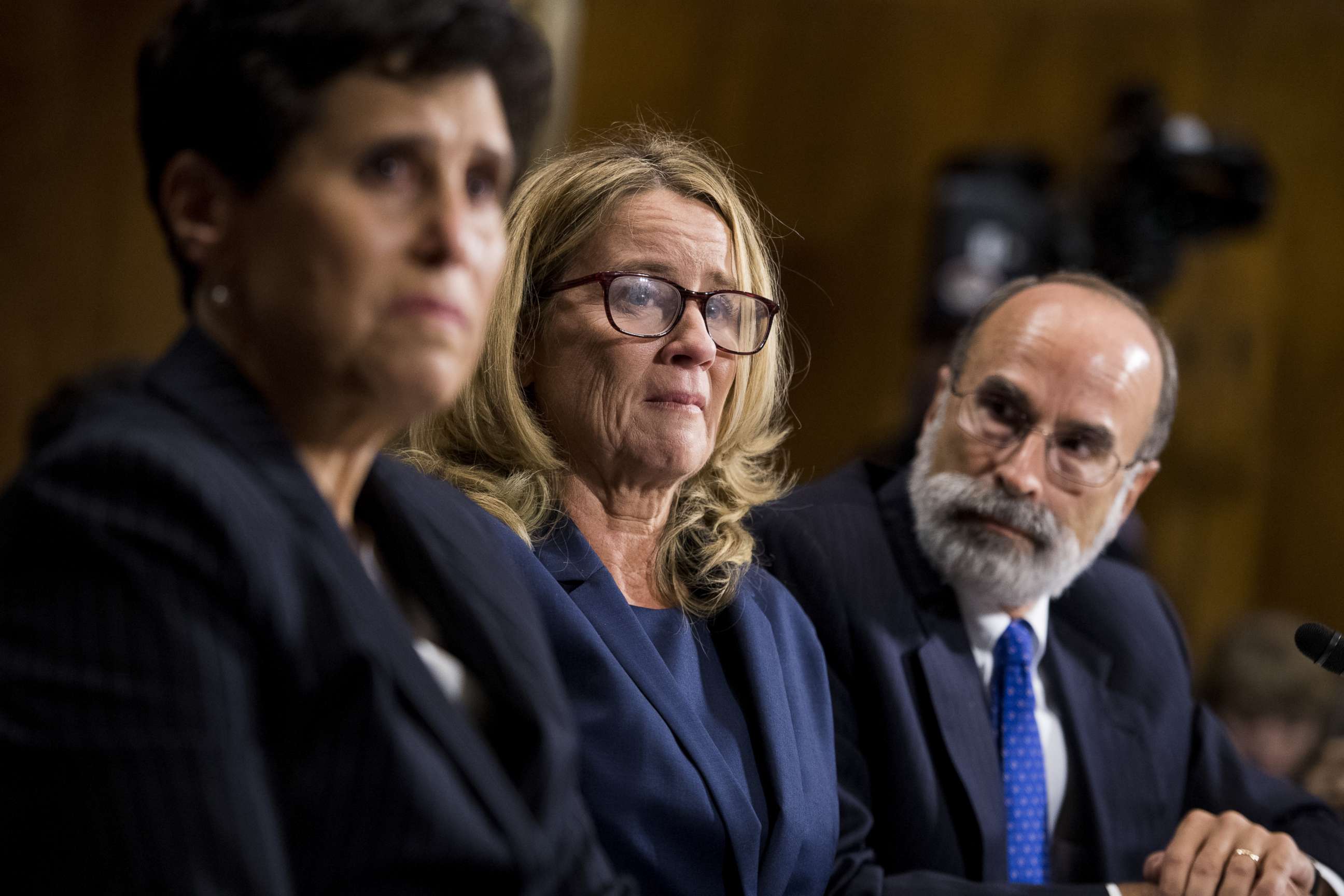 PHOTO: Dr. Christine Blasey Ford, flanked by attorneys Debra Katz and Michael Bromwich, testifies during a Senate Judiciary Committee hearing on Capitol Hill, Sept. 27, 2018 in Washington.