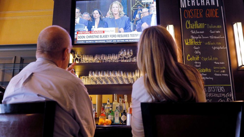 PHOTO: Diners watch the televised testimony by Christine Blasey Ford in the confirmation hearings for Supreme Court nominee Brett Kavanaugh by the Senate Judiciary Committee, at a restaurant in Boston, Sept. 27, 2018.