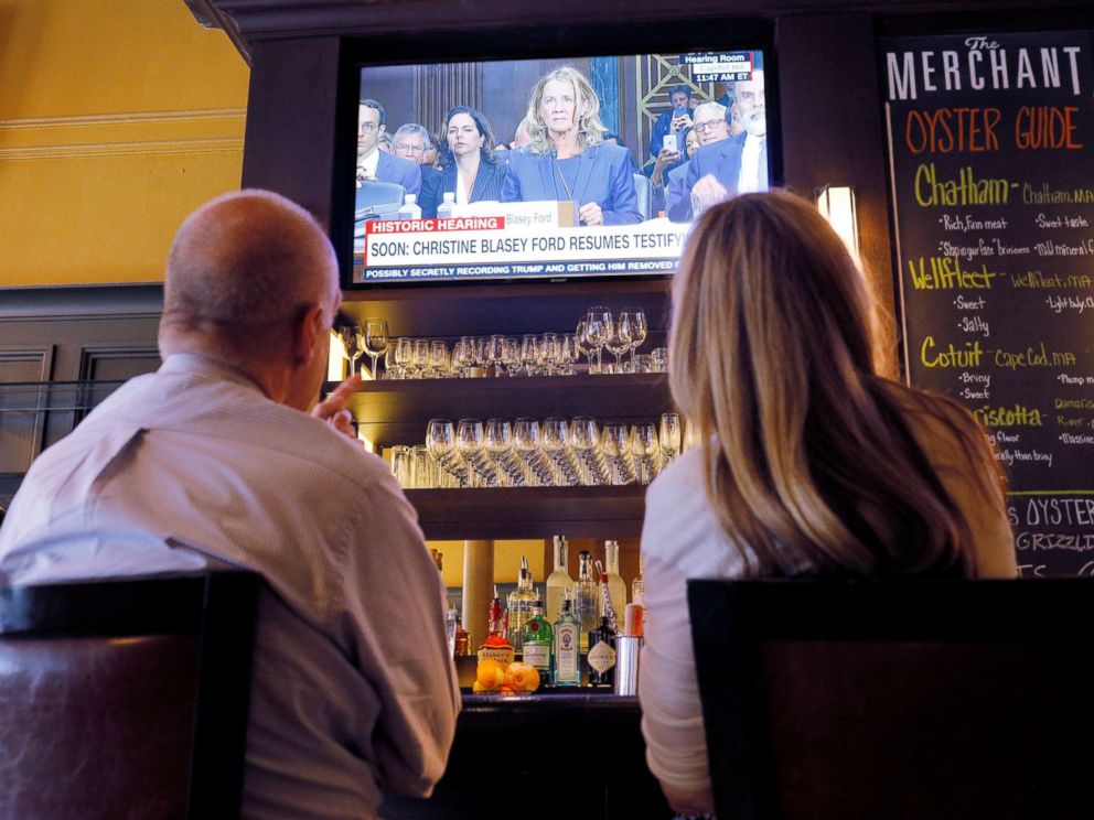 PHOTO: Diners watch the televised testimony by Christine Blasey Ford in the confirmation hearings for Supreme Court nominee Brett Kavanaugh by the Senate Judiciary Committee, at a restaurant in Boston, Sept. 27, 2018.