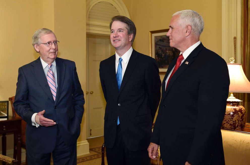 PHOTO: Senate Majority Leader Mitch McConnell, left, speaks about Supreme Court nominee Brett Kavanaugh, center, alongside Vice President Mike Pence on Capitol Hill in Washington, July 10, 2018.