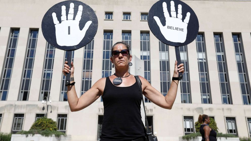 PHOTO: An woman expresses support for Christine Blasey Ford, the university professor who has accused U.S. Supreme Court nominee Brett Kavanaugh of sexual assault in 1982voutside U.S. District Court in Washington, Oct. 4, 2018.