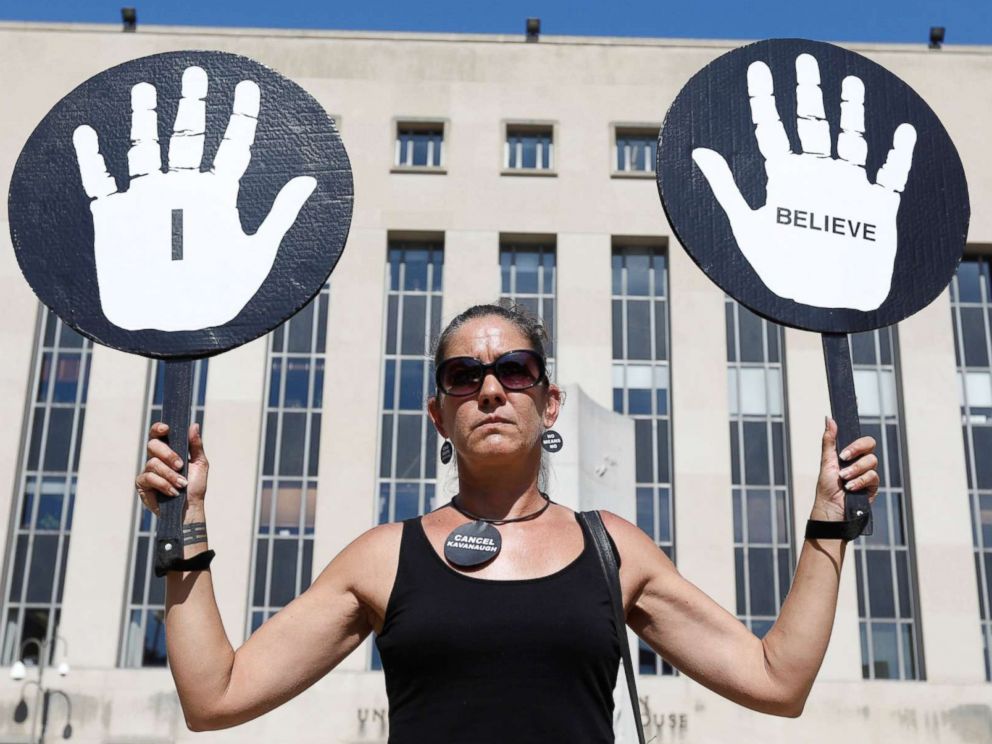 PHOTO: An woman expresses support for Christine Blasey Ford, the university professor who has accused U.S. Supreme Court nominee Brett Kavanaugh of sexual assault in 1982voutside U.S. District Court in Washington, Oct. 4, 2018.