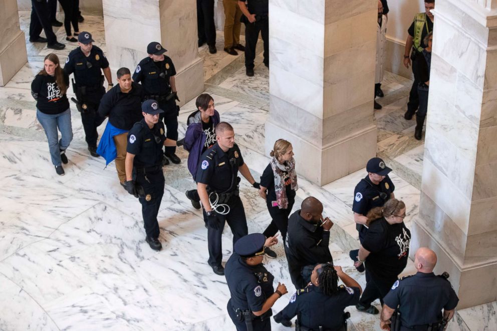 PHOTO: Activists opposed to Supreme Court nominee, Brett Kavanaugh, are arrested on Capitol Hill in Washington, Sept. 24, 2018.