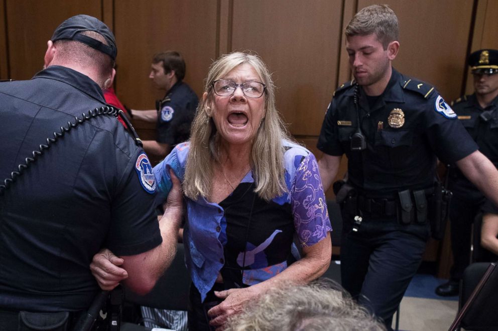 PHOTO: A woman is removed from the hearing by police as she shouts in protest against judge Brett Kavanaugh during the Senate Judiciary Committe's confirmation hearing on his nomination in Washington, Sept. 5, 2018.