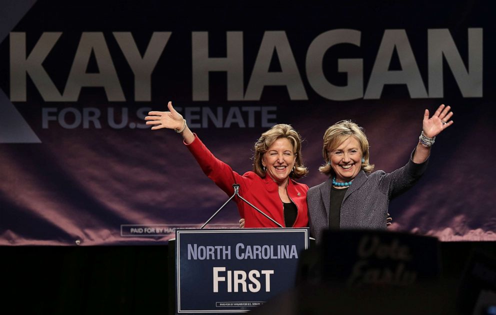 PHOTO: Former U.S. Secretary of State Hillary Clinton, right, campaigns for Sen. Kay Hagan, left, D-N.C., during a rally in Charlotte, N.C., Oct. 25, 2014.