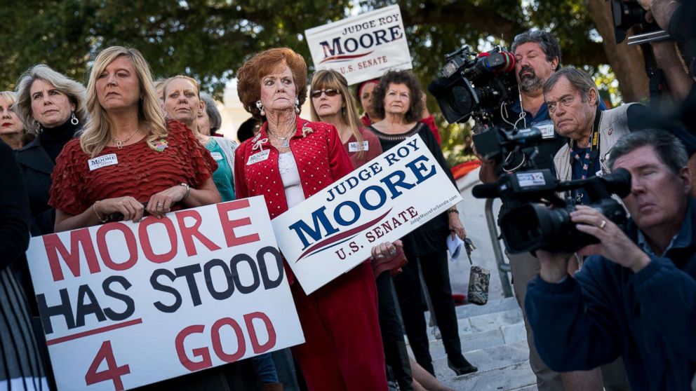 PHOTO: Women attend a 'Women For Moore' rally in support of Republican candidate for Senate Judge Roy Moore, in front of the Alabama State Capitol, Nov. 17, 2017 in Montgomery, Ala.