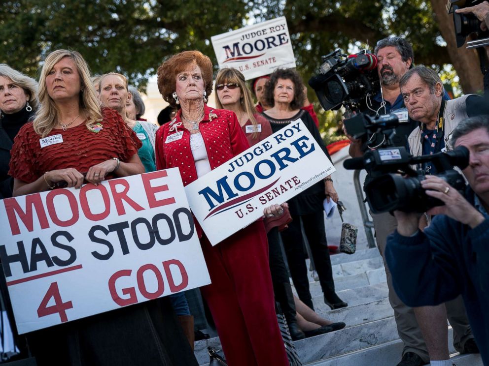 PHOTO: Women attend a Women For Moore rally in support of Republican candidate for Senate Judge Roy Moore, in front of the Alabama State Capitol, Nov. 17, 2017 in Montgomery, Ala.