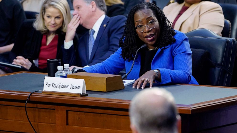 PHOTO: Supreme Court nominee Judge Ketanji Brown Jackson responds to a question from Sen. Thom Tillis, foreground, as she testifies before the Senate Judiciary Committee on Capitol Hill in Washington, D.C., March 23, 2022, during her confirmation hearing.