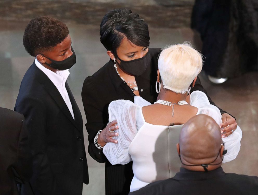 PHOTO: Mayor Keisha Lance Bottoms (left) consoles Tomika Miller, the wife of Rayshard Brooks, at the conclusion of his funeral in Ebenezer Baptist Church, June 23, 2020, in Atlanta.