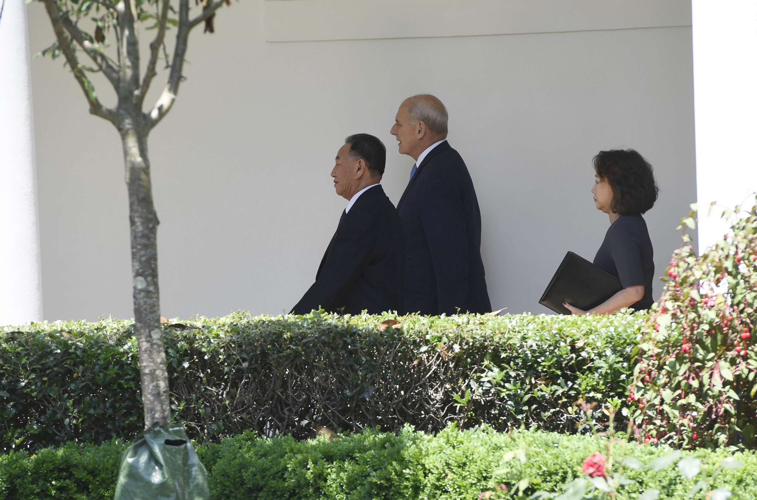 PHOTO: White House Chief of Staff John Kelly, center, escorts North Korean Kim Yong Chol,  left, to the White House, June 1, 2018, for a meeting with President Donald Trump.