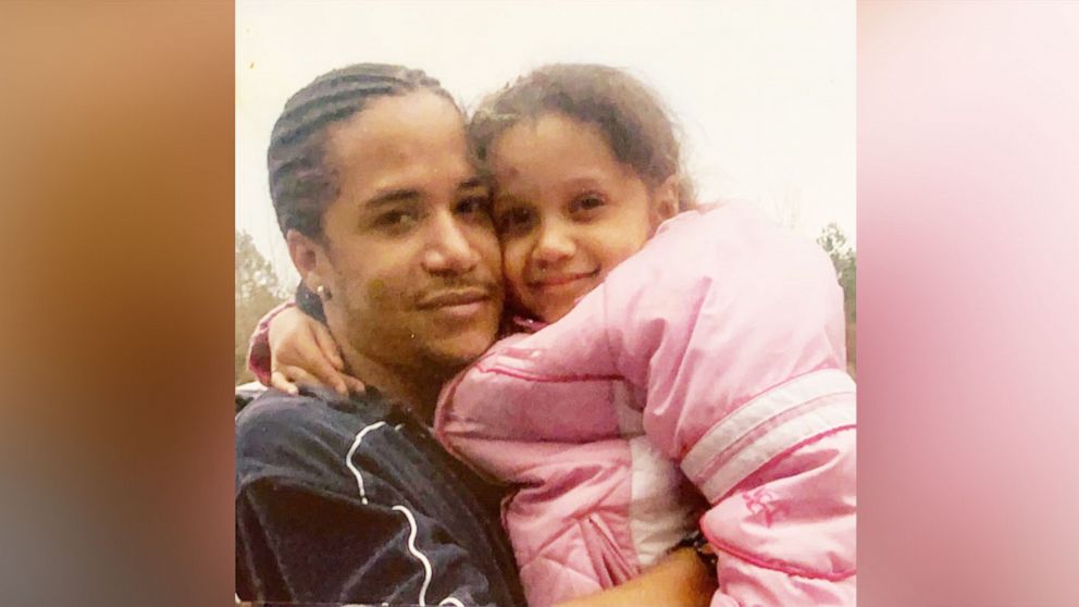 PHOTO: Kelvin Silva holds his daughter Leslie.