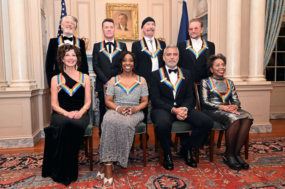 PHOTO: Kennedy Center Honorees for 2022, Amy Grant, Gladys Knight, George Clooney, Tania León, join U2 band members, Adam Clayton, Larry Mullen Jr., The Edge, and Bono at the State Department, Dec. 3, 2022, in Washington. 