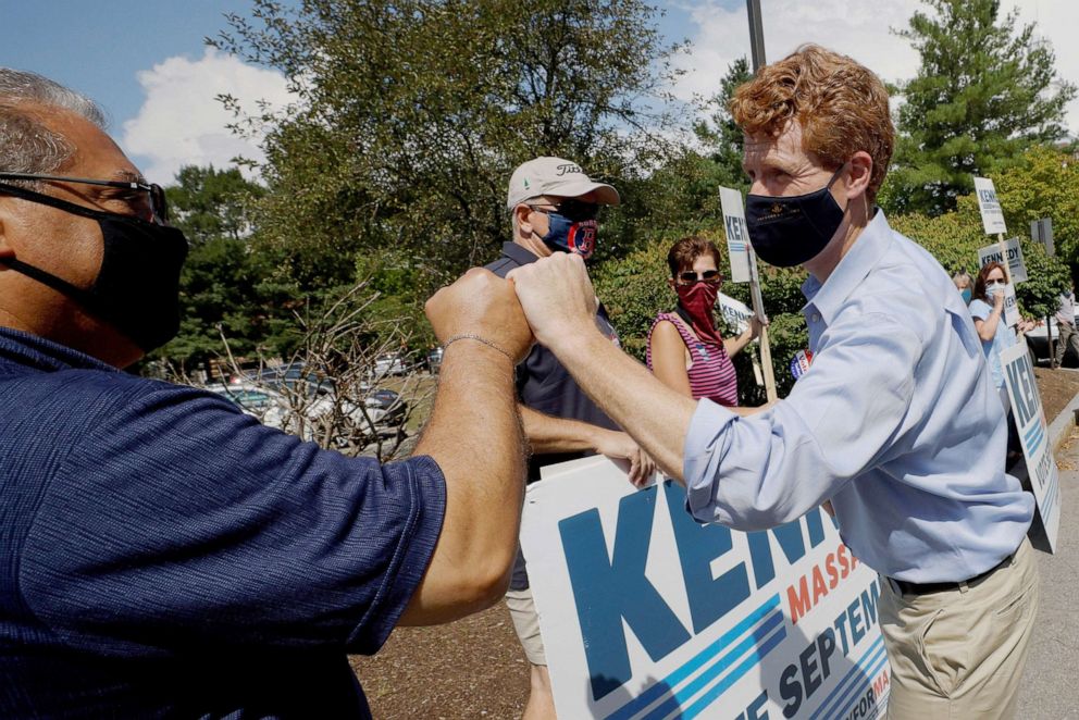 PHOTO: Democratic candidate for the Senate Joe Kennedy III greets supporters after casting his ballot on the first day of early voting for the Massachusetts statewide primary election in Newton, Mass., Aug. 22, 2020. 