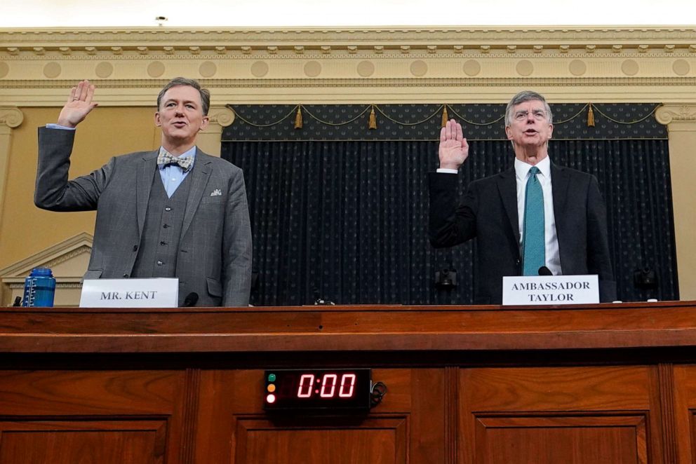 PHOTO: Deputy Assistant Secretary for European and Eurasian Affairs George P. Kent and top U.S. diplomat in Ukraine William B. Taylor Jr. are sworn-in prior to testifying before the House Intelligence Committee on Nov. 13, 2019, in Washington, D.C.