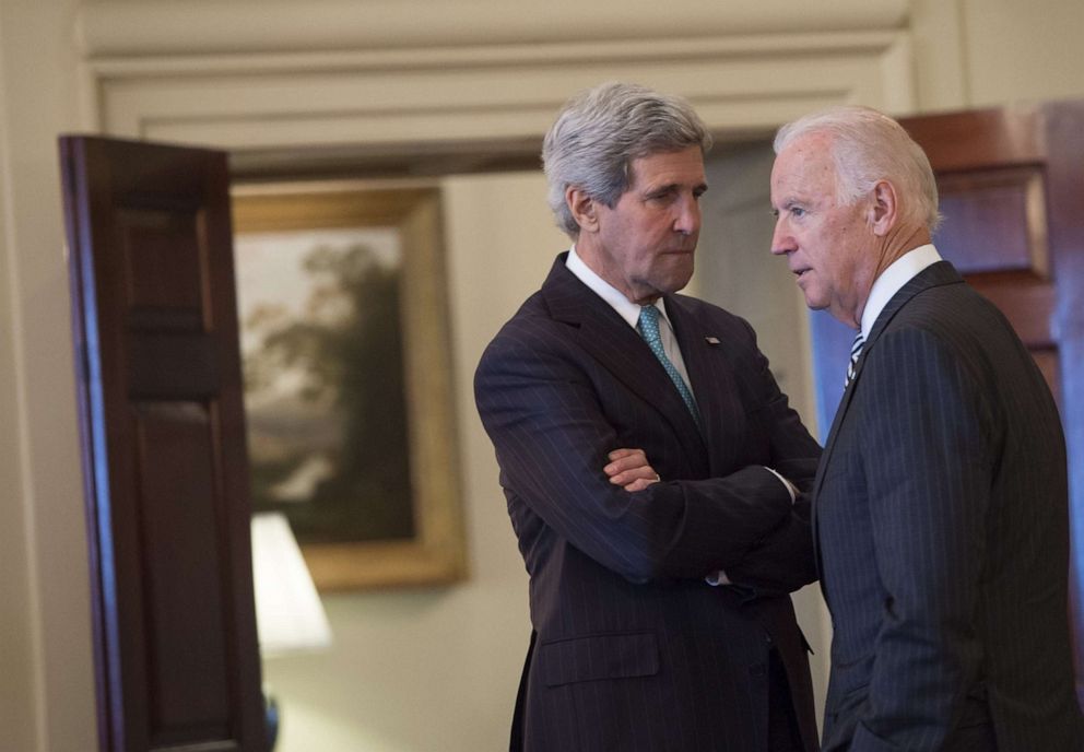 PHOTO: Secretary of State John Kerry speaks with Vice President Joe Biden prior to a lunch at the US State Department in Washington on June 30, 2014.