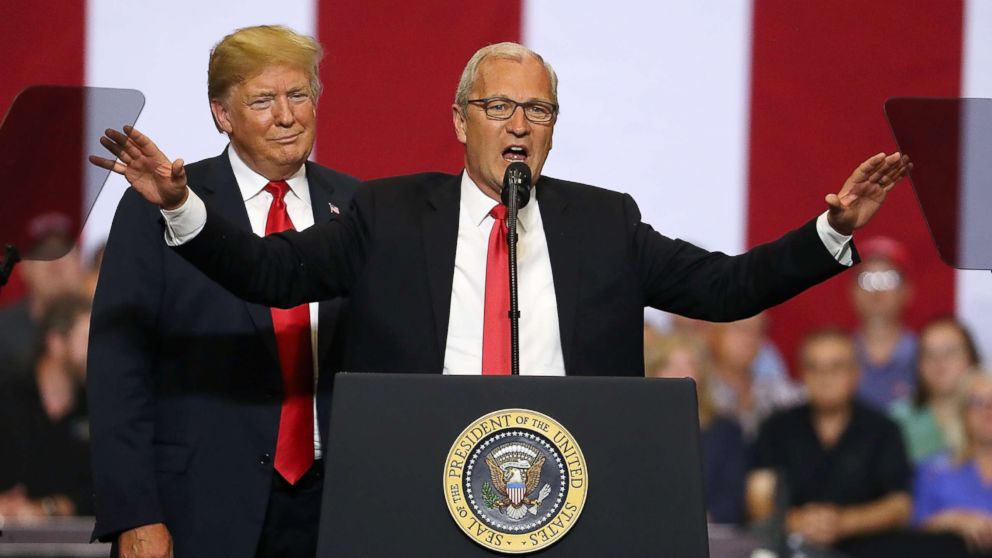 PHOTO: President Donald Trump looks on as Republican candidate for senate, Rep. Kevin Cramer, speaks to supporters during a campaign rally at Scheels Arena on June 27, 2018 in Fargo, N.D.