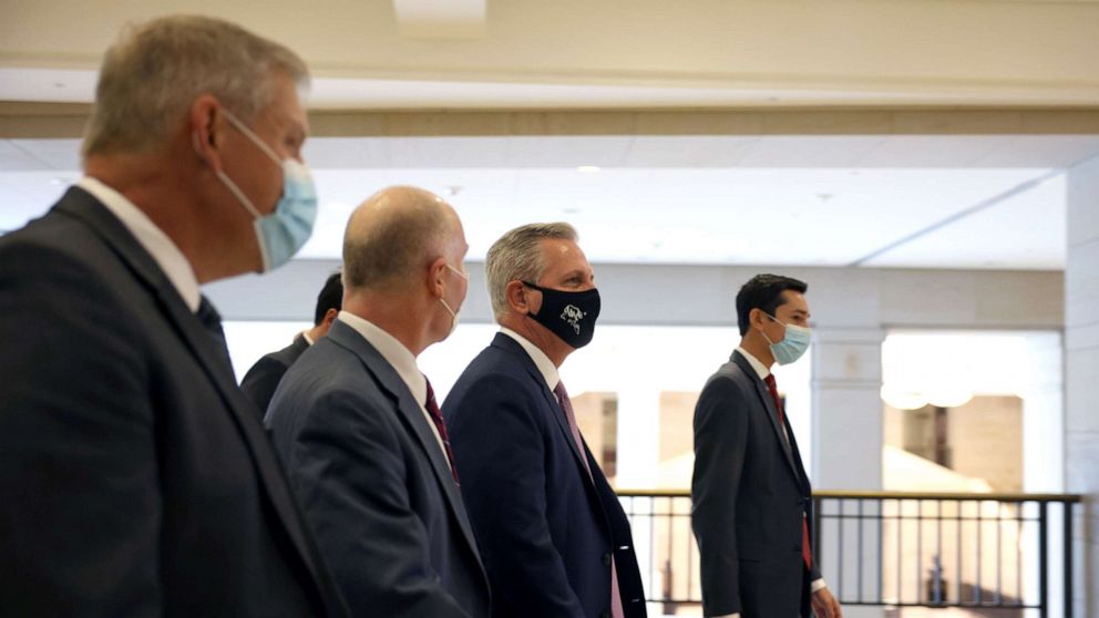 PHOTO: House Minority Leader Kevin McCarthy arrives for a caucus meeting in the U.S. Capitol Visitors Center, May 12, 2021, in Washington, DC.