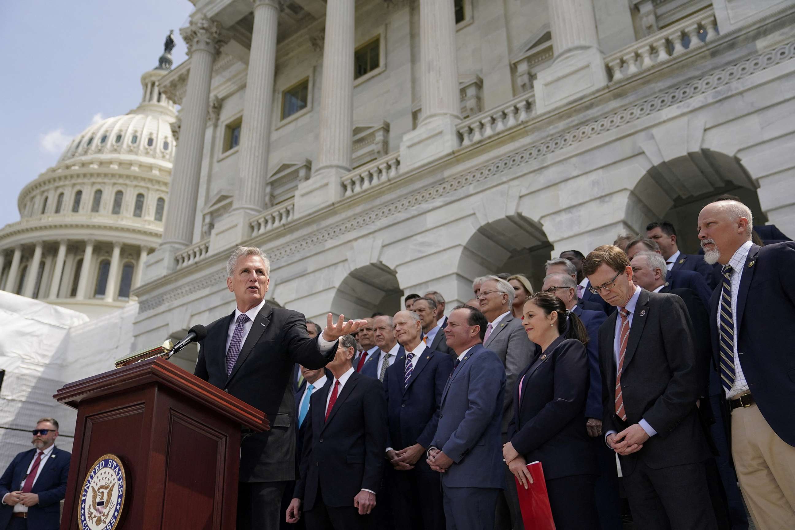 PHOTO: U.S. Speaker of the House Kevin McCarthy speaks to reporters as he stands with Republicans from both the U.S. House and Senate outside the U.S. Capitol, May 17, 2023, in Washington.