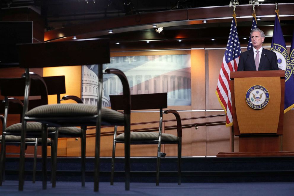 PHOTO: Reporters practice social distancing as House Minority Leader Kevin McCarthy holds a news conference about legislation addressing the coronavirus pandemic at the Capitol, March 26, 2020 in Washington.