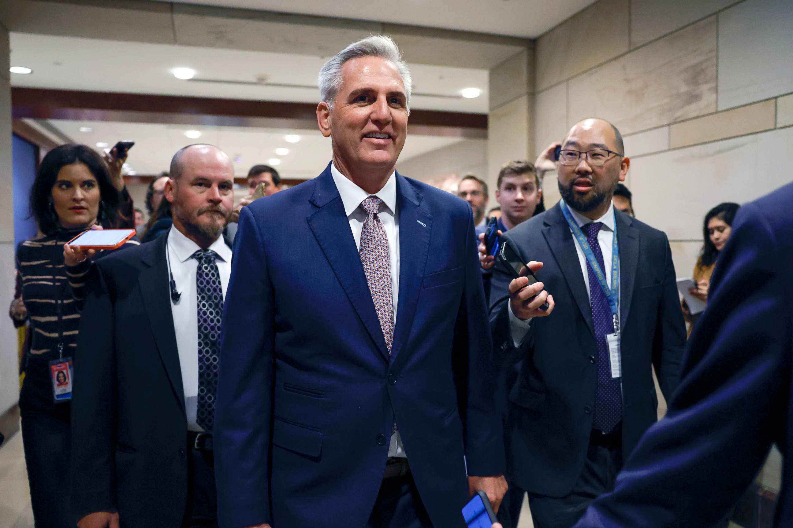 PHOTO: House Minority Leader Kevin McCarthy, R-Calif., is followed by reporters as he arrives to a House Republican Caucus meeting at the U.S. Capitol Building on Nov. 14, 2022, in Washington, D.C.