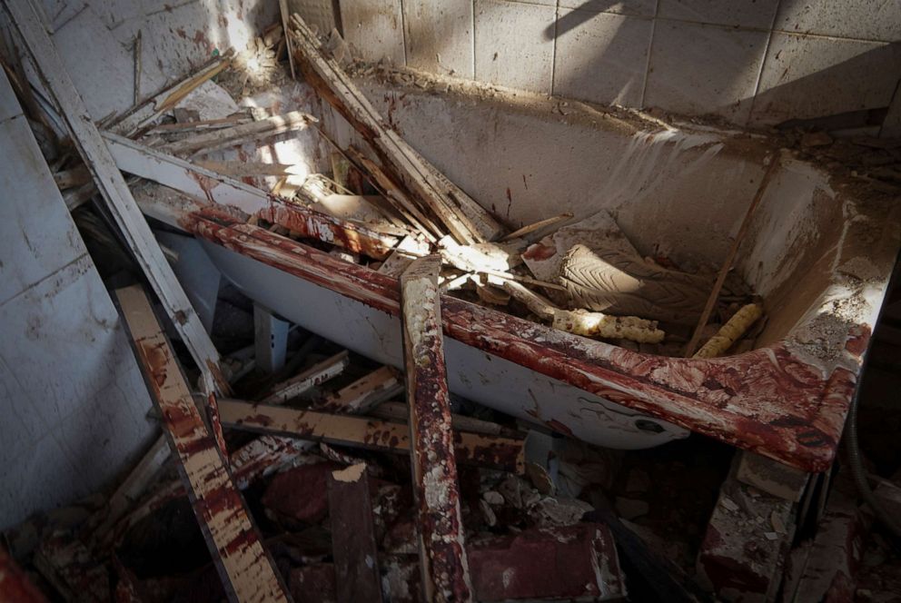 PHOTO: A bloodied bathroom is pictured in a building destroyed during a missile strike in Kharkiv, Ukraine, Aug. 18, 2022.