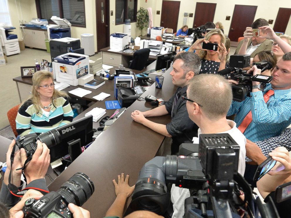 PHOTO: David Moore, center, and his partner David Ermold attempt to apply for a marriage license at the Rowan County Courthouse in Morehead, Ky., Sept. 1, 2015.