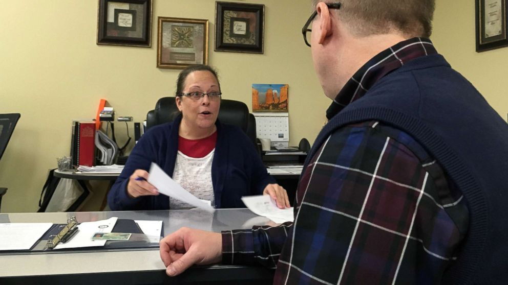 PHOTO: David Ermold speaks with Clerk Kim Davis as he files to run for Rowan County Clerk Wednesday, Dec. 6, 2017, in Morehead, Ky.