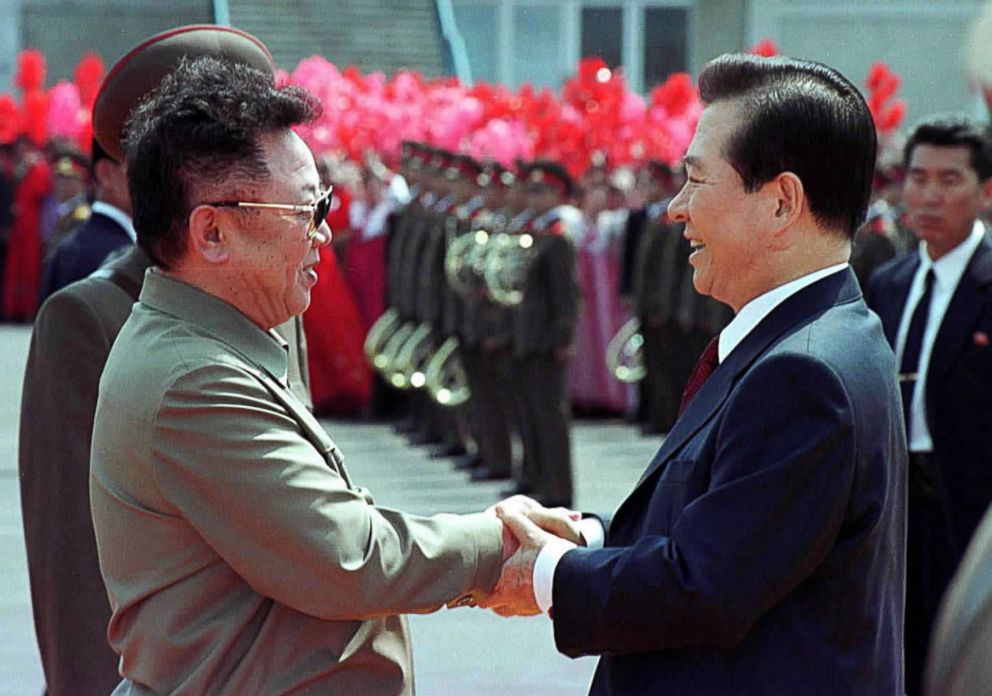 PHOTO: North Korean leader Kim Jong Il, left, and South Korean President Kim Dae-jung, right, shake hands as Kim Dae-jung arrives June 13, 2000 at the Sunan International Airport in Pyongyang, North Korea. 