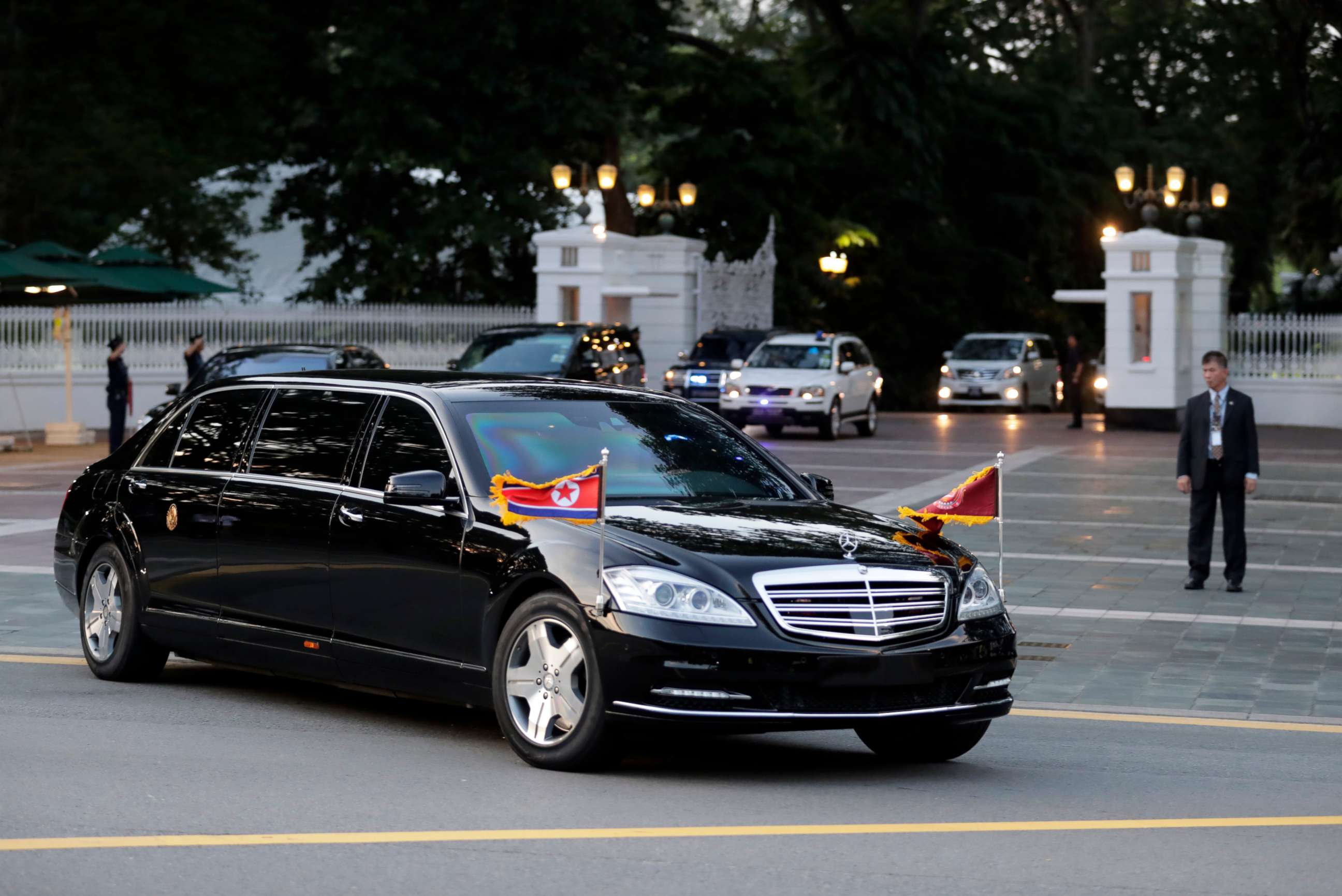 PHOTO: The car with flags flying carrying North Korean leader Kim Jong-un leaves Istana Presidential Palace after a meeting with Singapore Prime Minister Lee Hsien Loong in Singapore, June 10, 2018.