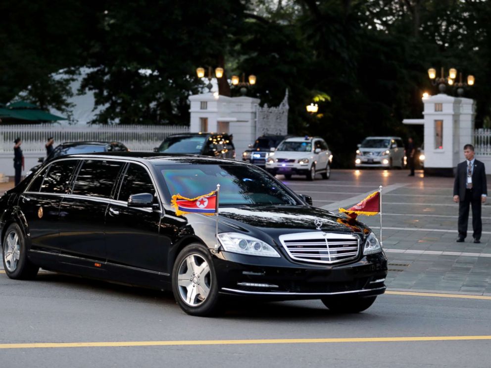 PHOTO: The car with flags flying carrying North Korean leader Kim Jong-un leaves Istana Presidential Palace after a meeting with Singapore Prime Minister Lee Hsien Loong in Singapore, June 10, 2018.