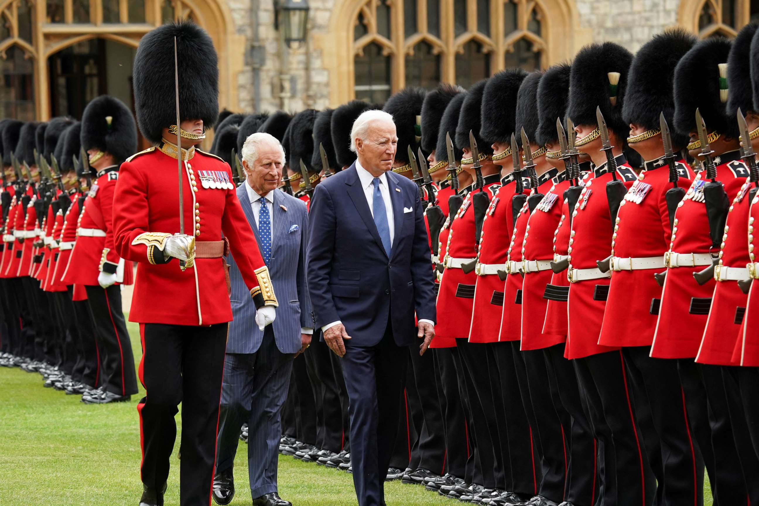PHOTO: President Joe Biden participates in a ceremonial arrival and inspection of the honor guard with Britain's King Charles at Windsor Castle in Windsor, Britain, July 10, 2023.