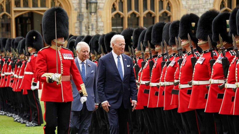 PHOTO: President Joe Biden participates in a ceremonial arrival and inspection of the honor guard with Britain's King Charles at Windsor Castle in Windsor, Britain, July 10, 2023.