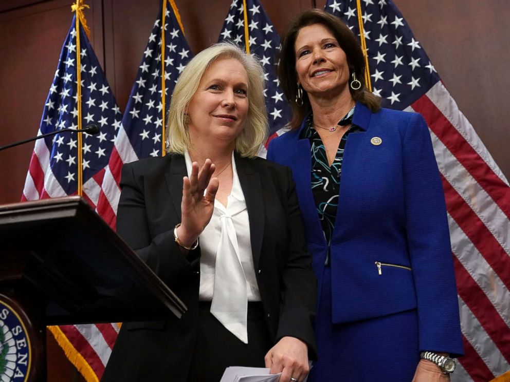 PHOTO: Sen. Kirsten Gillibrand, left, speaks, as Rep. Cheri Bustos listens, during a news conference, Dec. 6, 2017, on Capitol Hill in Washington.