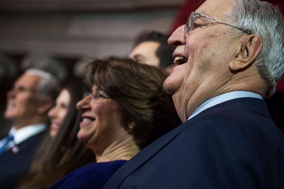 PHOTO: Former Vice President Walter Mondale is seen with Sen. Amy Klobuchar during a swearing-in ceremony for Sen. Tina Smith in the Capitol's Old Senate Chamber, on January 3, 2018, in Washington D.C.