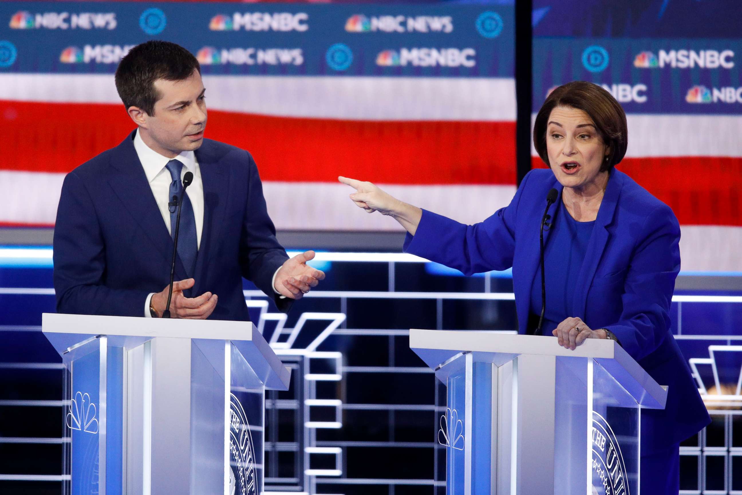 PHOTO: Democratic presidential candidates, Sen. Amy Klobuchar, D-Minn., right, speaks as former South Bend Mayor Pete Buttigieg looks on during a Democratic presidential primary debate, Feb. 19, 2020, in Las Vegas, hosted by NBC News and MSNBC.