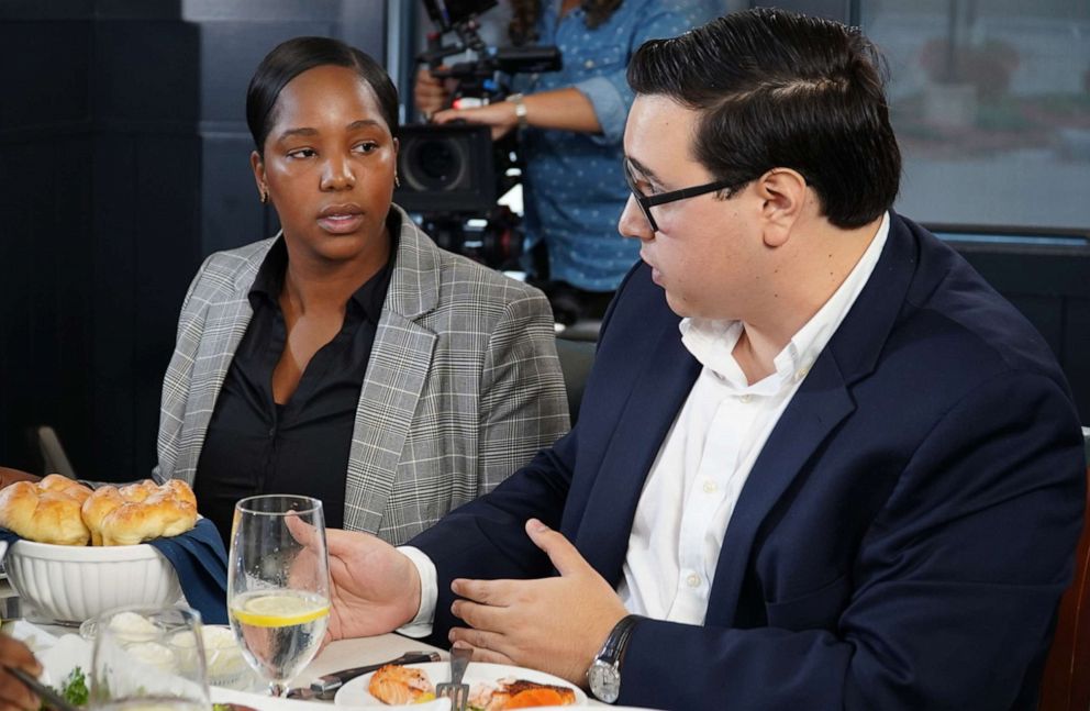 PHOTO: Massachusetts voters Lianne Hughes-Odom and Neil Sharma participate in a  conversation with 2020 Democratic presidential candidate Amy Klobuchar at a restaurant in Bedford, N.H., along with ABC News' Byron Pitts.