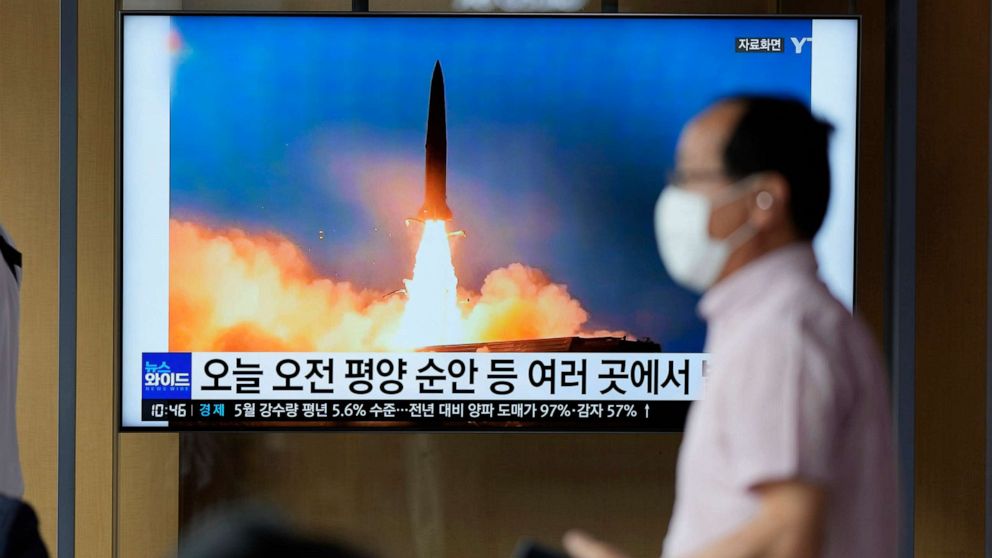 PHOTO: A TV screen showing a news program reporting about Sunday's North Korean missile launch with file image, is seen at a train station in Seoul, South Korea, June 5, 2022.