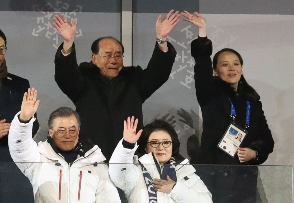 PHOTO: South Korean President Moon Jae-in and first lady Kim Jung-sook, below, along with North Koreans Kim Yong-nam, and Kim Yo-jong, the sister of Kim Jong-un, wave as South and North Korean athletes marched under one flag, Feb. 9, 2018.