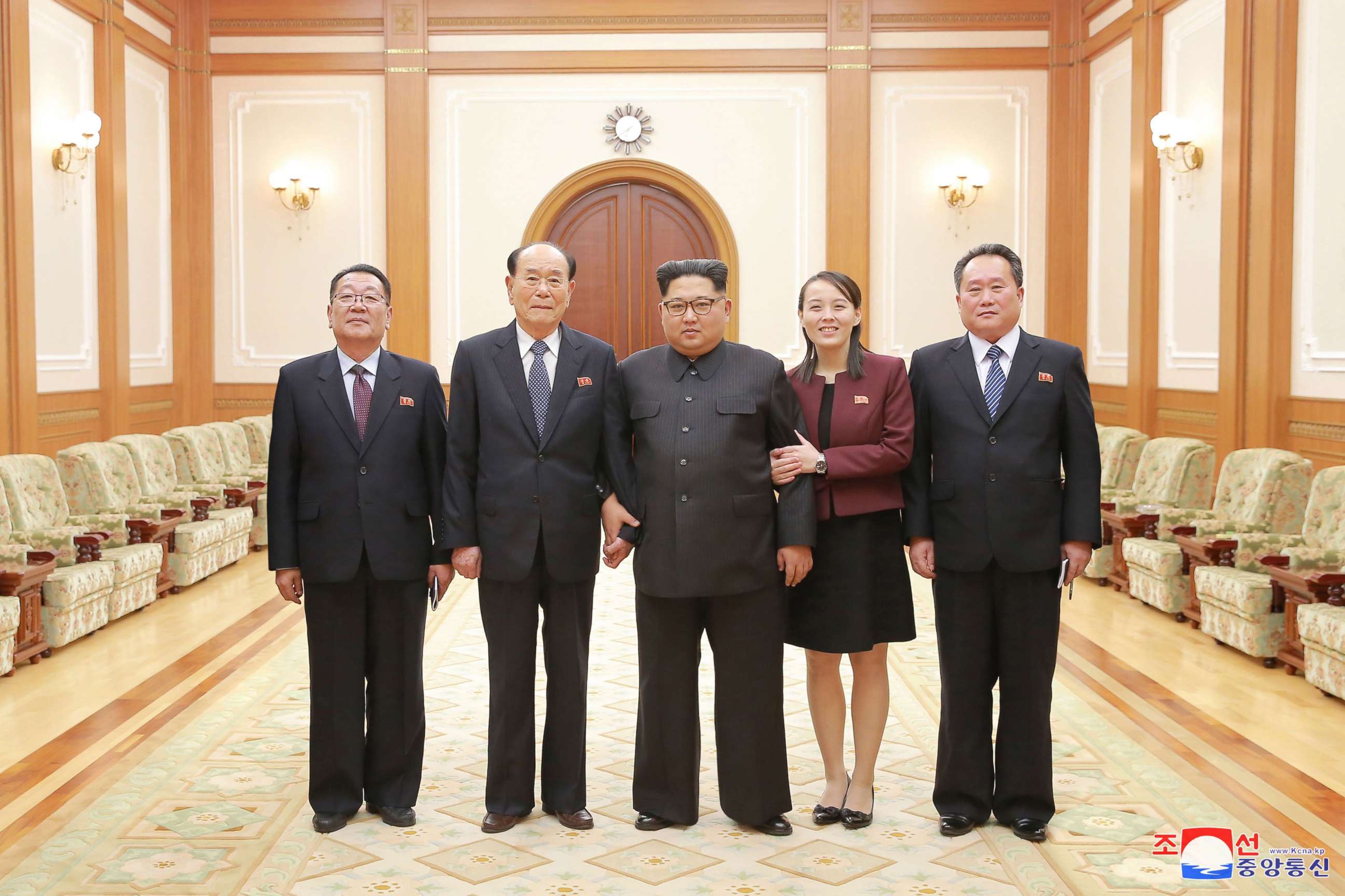 PHOTO: In a handout photograph released by the North Korean News Agency, North Korea's Kim Jong-un, center is shown with members of the high-level delegation, including his sister, Kim Yo-jong, who visited South Korea to attend the 2018 Winter Olympics.