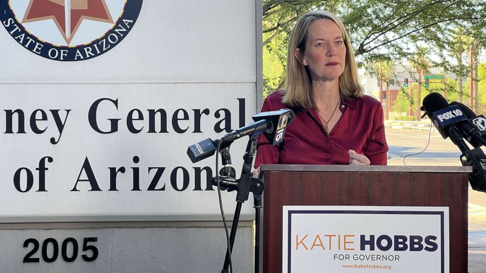 PHOTO: Arizona attorney general candidate Kris Mayes reacts to a judge ruling that a near-total abortion ban must be enforced in Arizona, at a press conference outside the Attorney General's office in Phoenix, on Sept. 24, 2022.