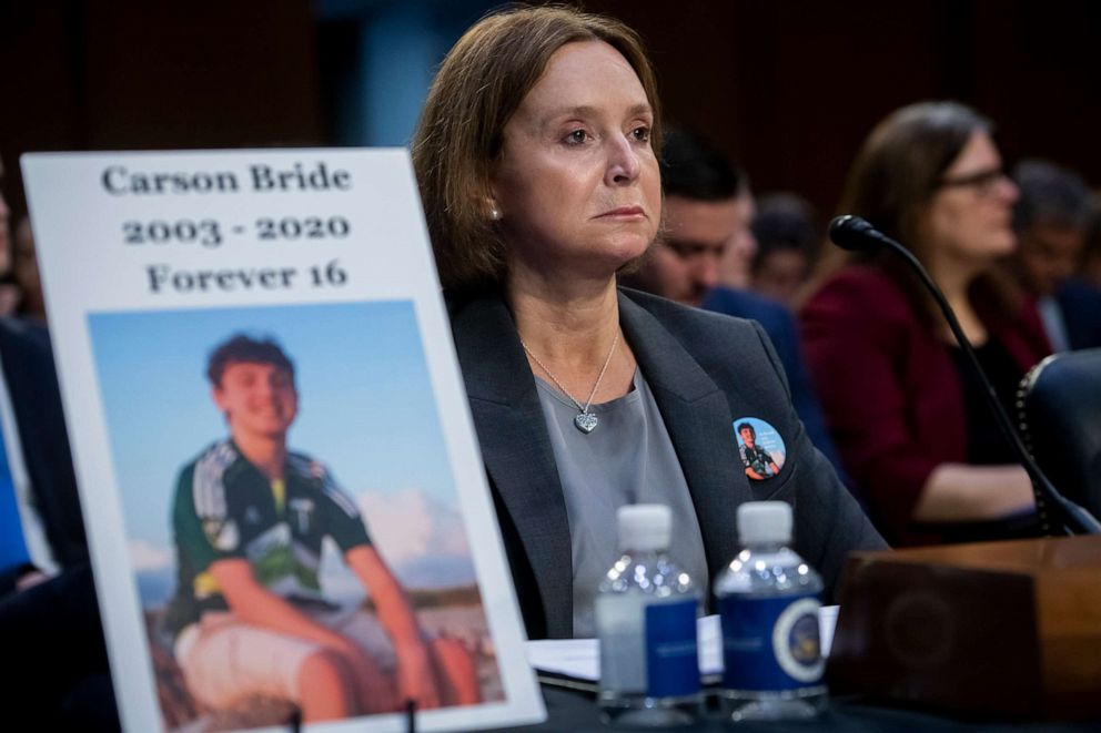 PHOTO: Kristin Bride, Survivor Parent and Social Media Reform Advocate, sits next to a photo of her 16-year-old son Carson as she appears before a Senate Committee on the Judiciary hearing to examine protecting our children online in DC, Feb. 14, 2023.