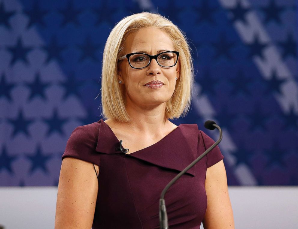 PHOTO: Rep. Kyrsten Sinema, D-Ariz., goes over the rules in a studio prior to a televised debate with Rep. Martha McSally, R-Ariz., Oct. 15, 2018, in Phoenix. Both candidates are seeking to fill the seat of Sen. Jake Flake.