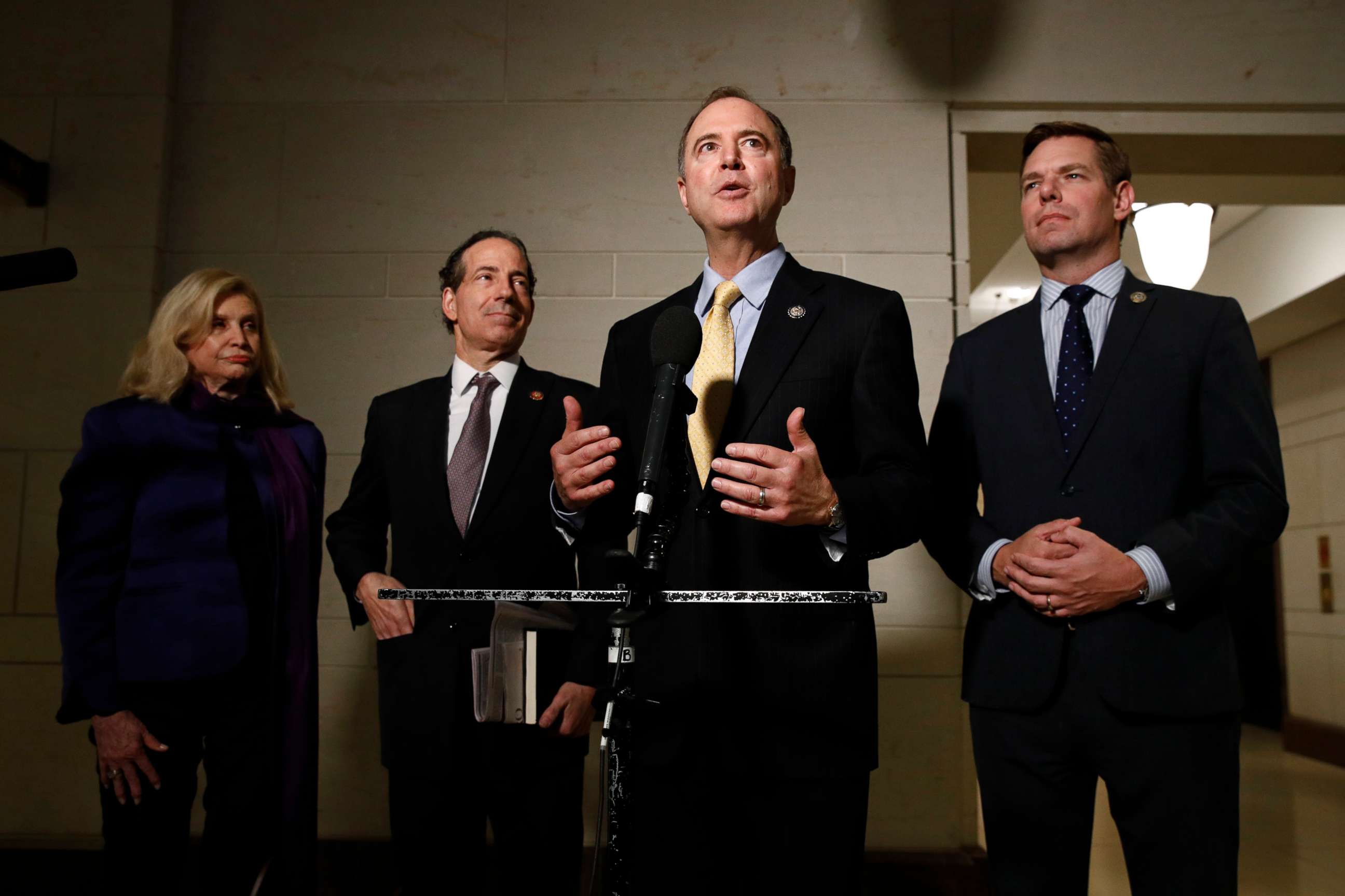 PHOTO: Rep. Adam Schiff, D-Calif., second from right, speaks with members of the media after former deputy national security adviser Charles Kupperman signaled that he would not appear as scheduled for a closed door meeting.