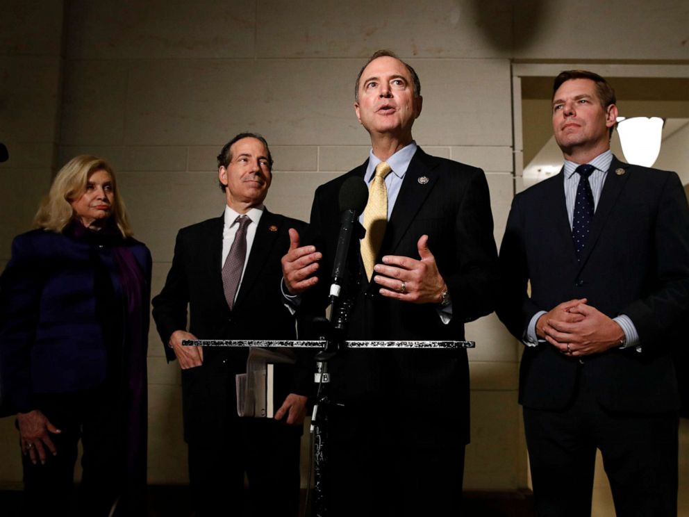 PHOTO: Rep. Adam Schiff, D-Calif., second from right, speaks with members of the media after former deputy national security adviser Charles Kupperman signaled that he would not appear as scheduled for a closed door meeting.